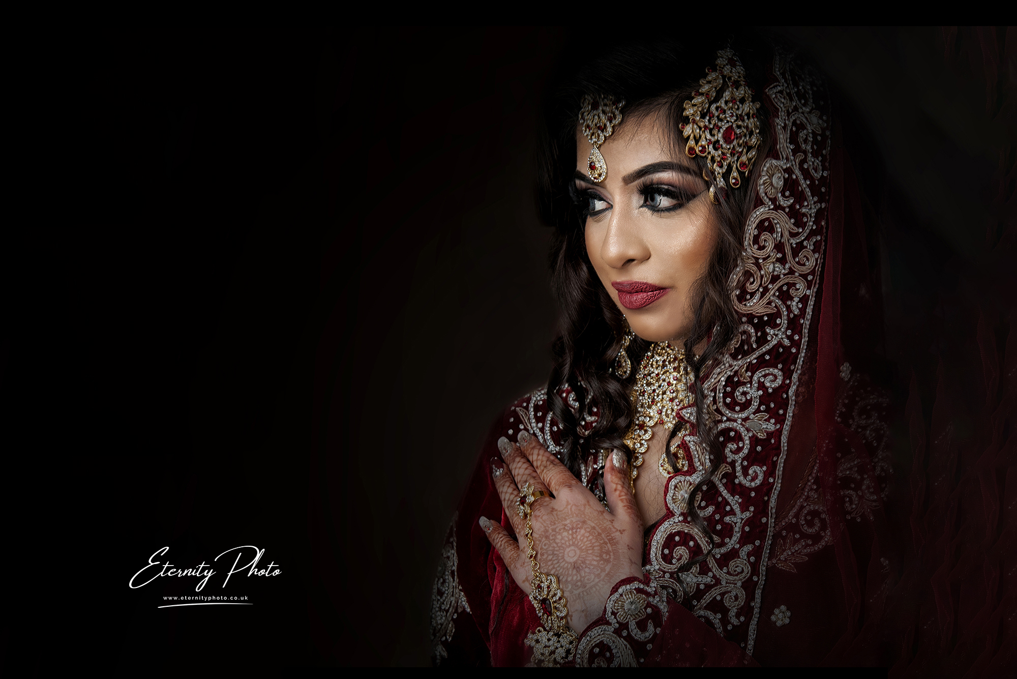 Bride in traditional South Asian wedding attire.